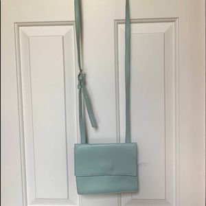 Small cross body light aqua bag